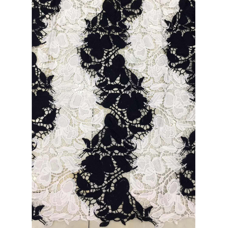 white and black lace fabric